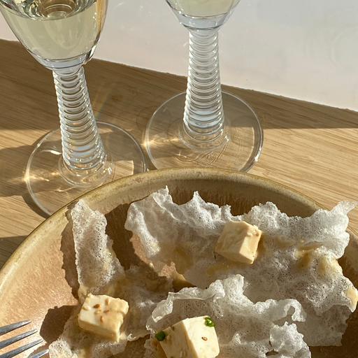 Puffed rice paper topped with CRAVERS Hazelnut butter marinated silken tofu - CRAVERS DE